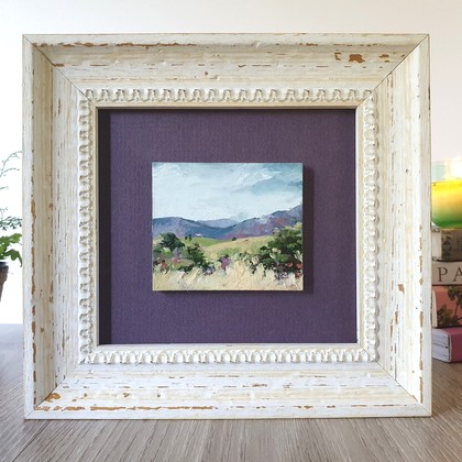 Miniature landscape of green hills with tiny cottage and Blue Mountains, oil on mini tile by Victoria Collins