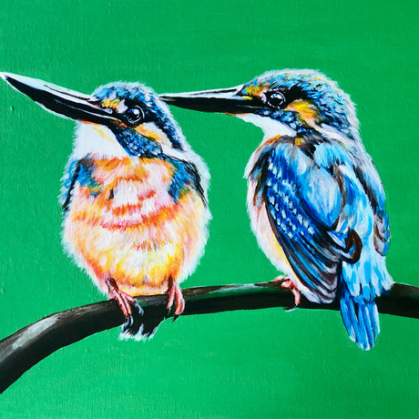 Two kingfishers hunting for food captured on the lookout.