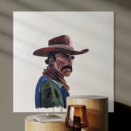 Green eyed cowboy with western style fashion and simple background. 