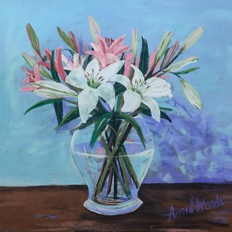 White and Pink Asiatic Lilies in  glass vase