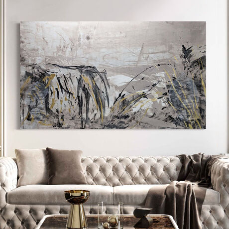 A large abstract landscape of trees and mountains in the outback in brown,  beige and black with gold leaf.