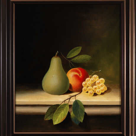 Pear and grapes placed on table top