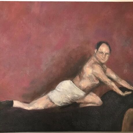 George Costanza shirtless pose on a couch