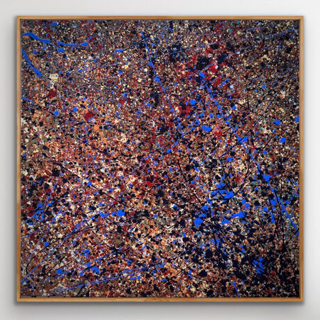 The dark background serves as a canvas for the vibrant splatters of gold, blue, and red, symbolising the bursts of energy and life that punctuate the void. 