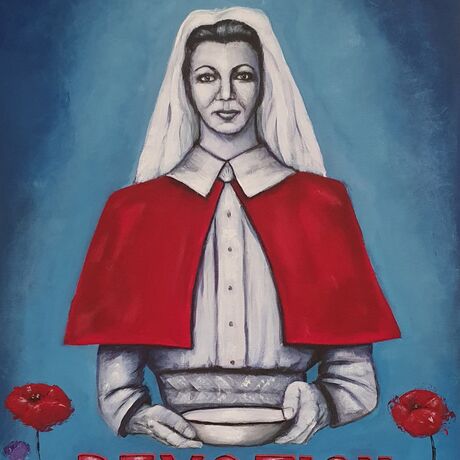 Portrait of a young nurse from WWI holding a bowl with the word Devotion underneath. Two red poppies and one purple poppy bookend the word. The nurse is in black and white tones with a bright red distinctive cape, the background is blue.