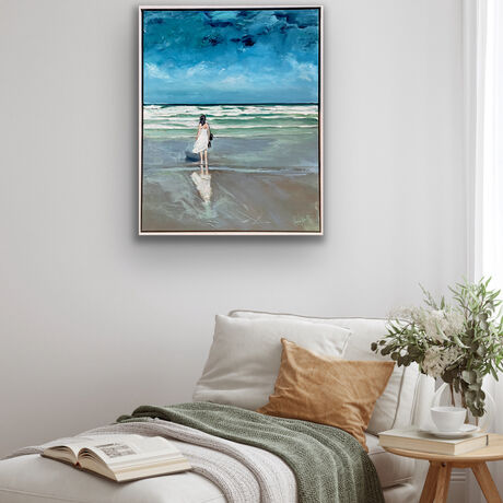 Girl in white dress stormy day at beach