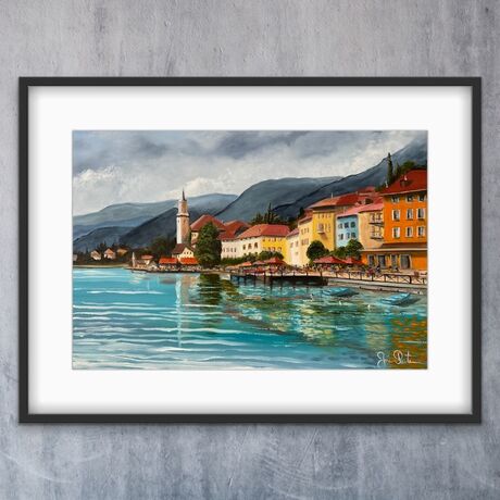 Buildings and boats on the shore of Lake Annecy in France