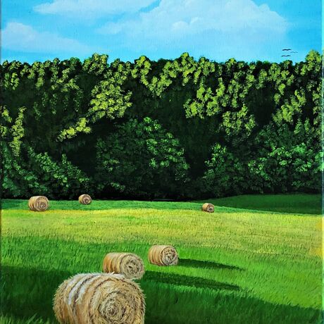 The artwork shows the hay bales in the rural part of North America.