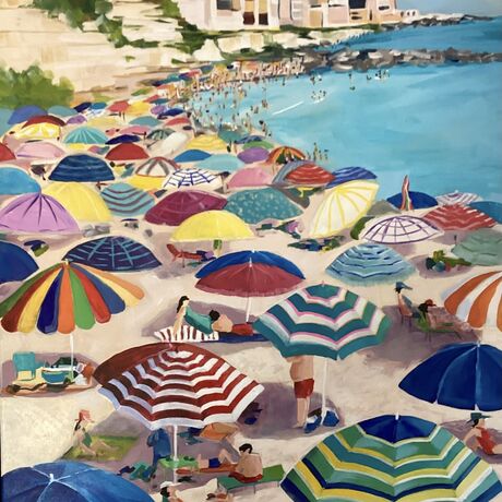 A beach scene full of bright fun beach umbrella's. 