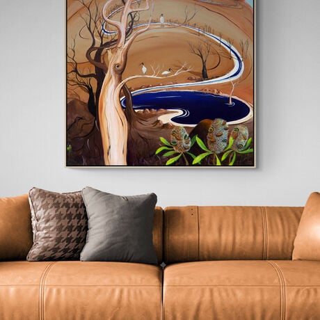 The Watering Hole by Tania Chanter is an abstract landscape painting, the canvas is bathed in warm caramel tones, creating an atmosphere of earthy richness and tranquility. A blue watering hole takes centre stage and trees and ibis birds randomly dot the landscape.