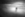 blurred lone figure on a deserted beach