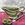 silver spoon with limes and green jug,  silver spoon with reflection, gravy jug with spoon,  green ceramic jug, limes jug and spoon