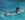 girl on surfboard paddling in ocean