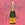 Veuve Cliquot Champagne Bottle on a pink background. Reassuringly Expensive written in glitter. 