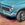 A classic blue Australian vintage car on a beach