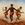 Three Aboriginal men performing traditional dance on the dusty ground.