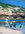 Mother and Children Looking For Treasures At The Rockpools.