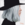 side profile of a woman with grey hair and wearing a fedora hat