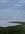 A view of the marshland, grass,  water and sky at the Waterfront Park in Charleston, South Carolina, USA.