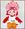 Pixelated doll sitting down