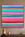 Stripes of different colours painted across the canvas to form a basic pattern