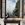 Magpie bird in window with cup of tea and landscape 