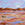 Peach and light blue desert landscape of outback Australia. Flat land with distant horizon. 