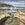 Rockpool reflections by the crashing waves