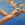 Swimmer floating in a stripped bikini with her head just above water