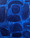 Blue organic shapes on blue streaky brush painted background