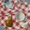 Pear and items on red gingham