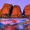 High contrast light at dusk upon the red rocks of the Olgas boulder formation group in the Uluru-Kata Tjuta National Park, Australia
