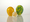 3 separate rounded glass pieces, one green flat leaf, one larger yellow bud and one smaller beige bud with yellow spots.