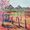 Landscape view of ochre fields, distance rocky hills, old fence, trees, shadows.