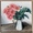 Flowering gum in milk jug on rustic timber table