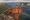 A unique view of the vast area of the Blue Mountains, NSW., featuring a unique leaning rock. 