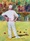 Man playing bowls in the sunshine.