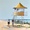 A yellow lifeguard tower at Surfers Paradise on the Gold Coast of Queensland.