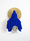 A hanging figure cloaked in a blue fabric in front of a gold disc