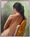 Female nude back view on chair