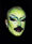 A portrait of a moustachioed, androgynous figure’s disembodied head on a black background. The figure wears elaborate drag makeup which features green skin and white swirling eyeliner. The figure wears an EarPod and has two gold sleepers in their ear.