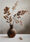  Still life with Dried Plant in Brown Vase, on the table
