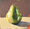 An original impasto painting of a pear, painted in acrylic paint on board, ready to hang with chord fastened to the back.