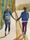 artwork which is the image of a couple walking hand in hand along the street