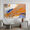 bold marks and colour fields in orange, peach, apricot, beige, white, blue and grey across a large canvas