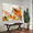 bold marks and colour fields in orange, ochre, peach, apricot, beige, white, green and grey across a large canvas