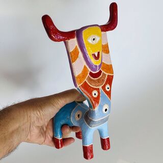 Brightly glazed ceramic minotaur. Most unusual piece.