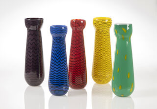 Set of five vases, five different colours, tall with black wiggly lines wrapping around in a spiral.