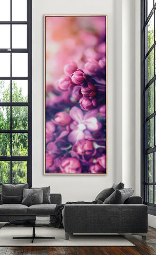 a very large bold painting of bright pink lillacs. Only a few buds are in focus with the rest of the floral bunch and background out of focus. deep pink, purple/lavendar shadows create a strong contrast. Has impact both horizontally and vertically.