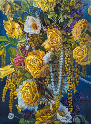 A floral arrangement featuring some yellow roses in a warm light set against a dark blue background. Some strings of pearls are draped among the flowers while the focus is on a silver pendant on a chain that suspends a single, large pearl. The pendant is teardrop shaped and inlaid with diamonds.